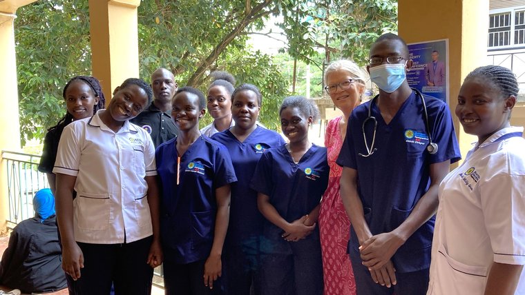 Brenda L and nursing students in Uganda