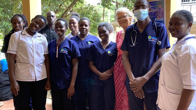 Peace Corps Uganda Volunteer Brenda poses with nursing students