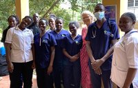 Peace Corps Uganda Volunteer Brenda poses with nursing students