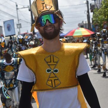 Calvin participates in a Mashramani parade in Guyana