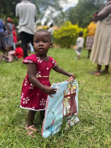 Child with mosquito net