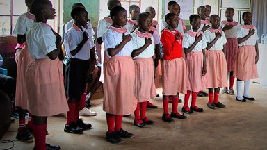 Children perform at DEAR Day in Uganda