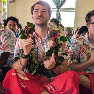 Christian B and fellow Volunteers perform a traditional Fijian dance.