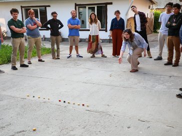 Volunteers playing the traditional Kyrgyz game “chuko”