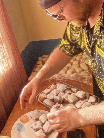 David spent much of his free time cooking and socializing with community members in Malawi.