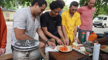 Volunteers Cooking Local meals