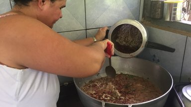 Host mom in Costa Rica mixing rice