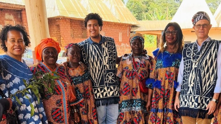 The chief’s wives greet John and his family upon arrival at the chief’s kingdom in Bamendjou.