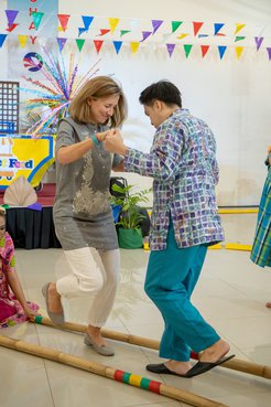 CD Jenner dancing the Tinikling, a Philippine cultural dance that uses a bamboo.