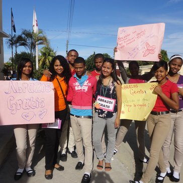 This activity was "Free Hugs Day," in which students and volunteer gave free hugs to community members and brochures to preve