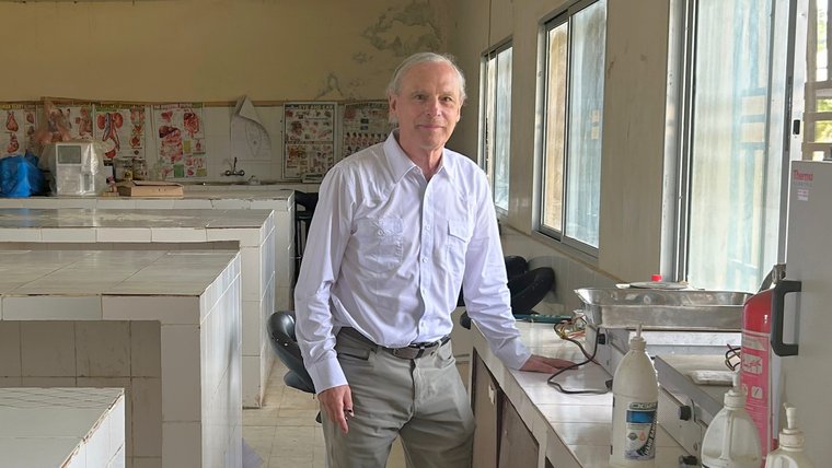 David in the lab at his host university in Liberia.