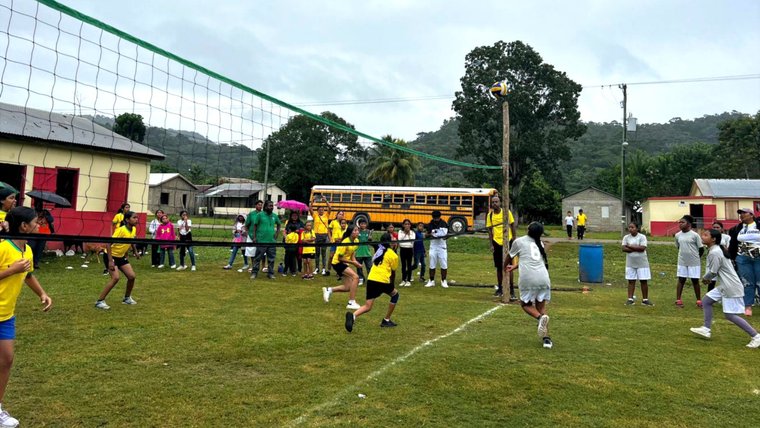 Devin supports a girls' volleyball program as part of his service in Belize.