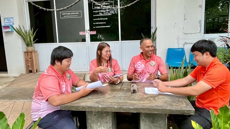 Brian meets with Division of Education staff in Thailand.