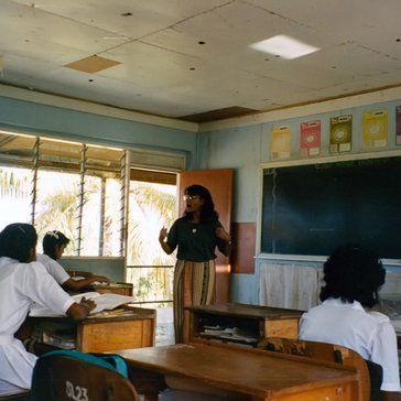 A Peace Corps Volunteer leads a literacy class in Fiji.