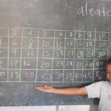 Dominican child with completed times tables