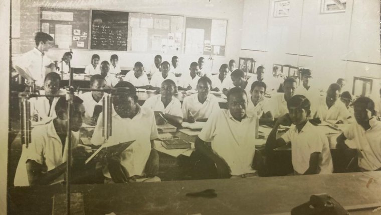 A Peace Corps Volunteer teaches a physics class in Tanzania in 1967