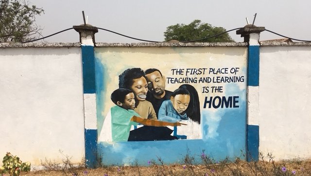 A mural in Sierra Leone promoting education as beginning in the home.