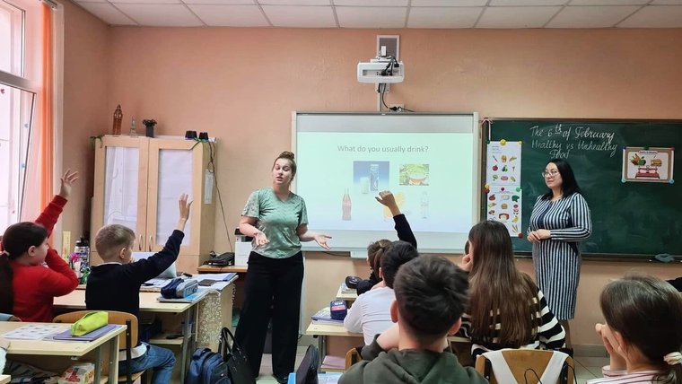 Brooke and her counterpart Elena teach English to students in Moldova.