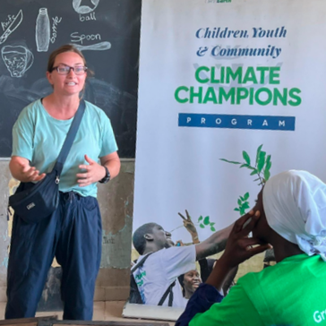 Emily translates a presentation about tree planting into Pulaar for students at a Gambian school.