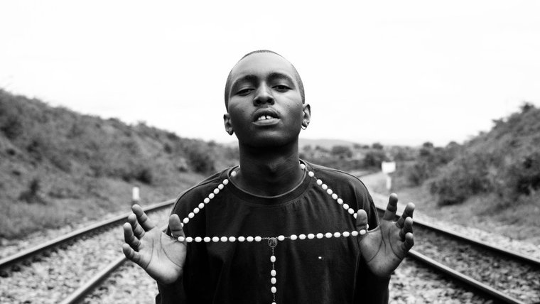 Young man with necklace
