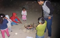 Friends and neighbors roasting their marshmallows.