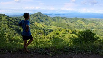 Kid at the mountaintop