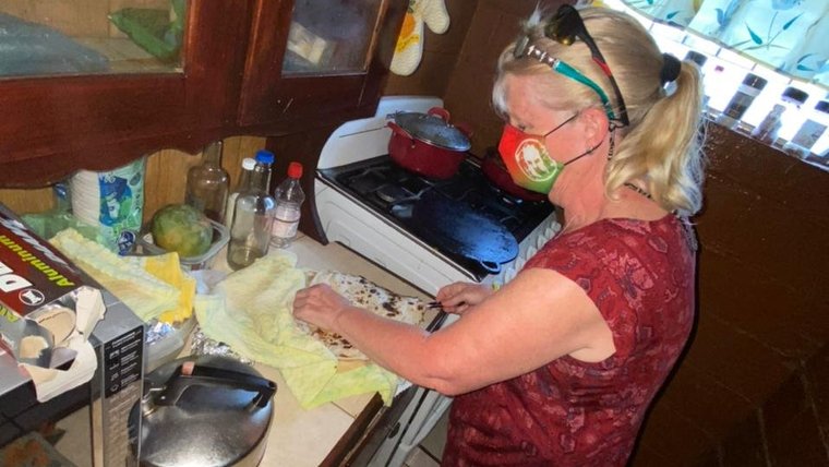 Genevieve learning to make Tortillas with host family