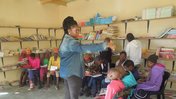 Volunteer teaches children