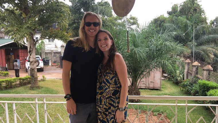Two Peace Corps Volunteers stand together at Close of Service.