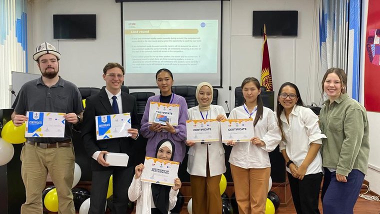 Volunteers with Spelling Bee contest winners in Jalal-Abad region