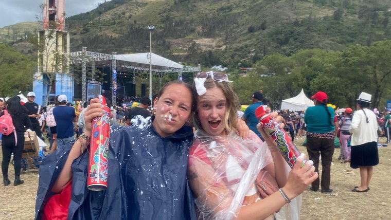 Fellow Volunteer Grace and Caroline have fun during Carnival in Ecuador.