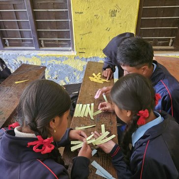 9th grade Nepali students work on algorithms.