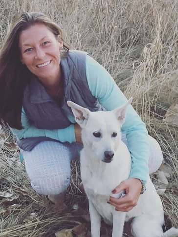 Karen, a veterinarian in Colorado, with her Peace Corps dog Callie.