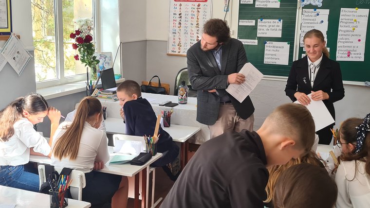 Declan co-teaches health education with his counterpart teacher, Ecaterina, in Moldova.