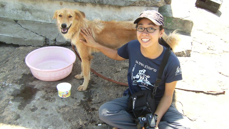 Hellen Phan and her dog in Uganda