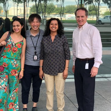 Woman with co-workers