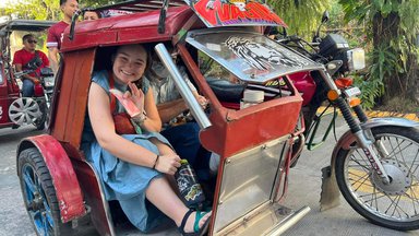 Trainee takes a Tricycle ride in the Philippines