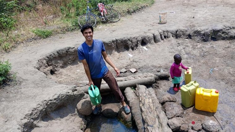 Joseph works with his community to repair communal hand pumps in Uganda.