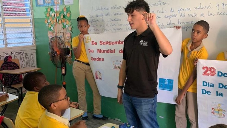 Aaron promotes Spanish literacy in the Dominican Republic.