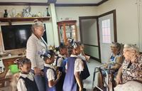 Peace Corps Volunteer Tiffany helped create a program to connect young readers and elderly people in Saint Lucia.