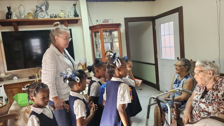 Peace Corps Volunteer Tiffany helped create a program to connect young readers and elderly people in Saint Lucia.