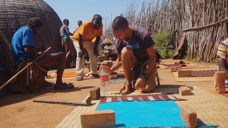 Nate preparing traditional regalia