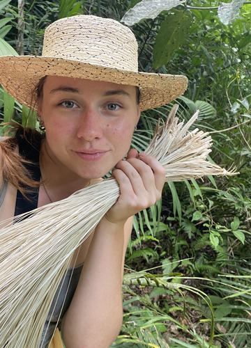 Peace Corps Volunteer Myra wears a sombrero, an important part of traditional Panamanian attire.