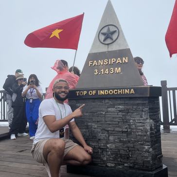Carleon climbed Fansipan, the highest mountain in IndoChina, with fellow teachers in Viet Nam.