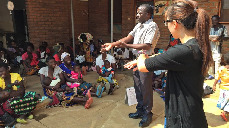 Peace Corps Volunteer and counterpart conduct a health demonstration.