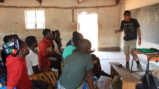 Education Volunteer Andrew teaches in a Malawian classroom.