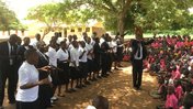Pupils communicate messages about Malaria using drama.