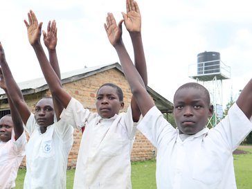 boys and young men at the Ngeny Special School for the Hearing Impaired participate in a GBV prevention workshop.