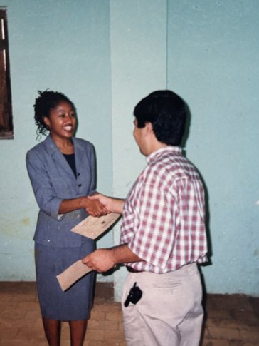 RPCV Krysta J. working with community members in Paraguay