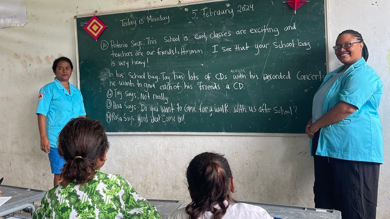 Jade and her counterpart teach English to 7th, 8th and 9th graders in Timor-Leste.
